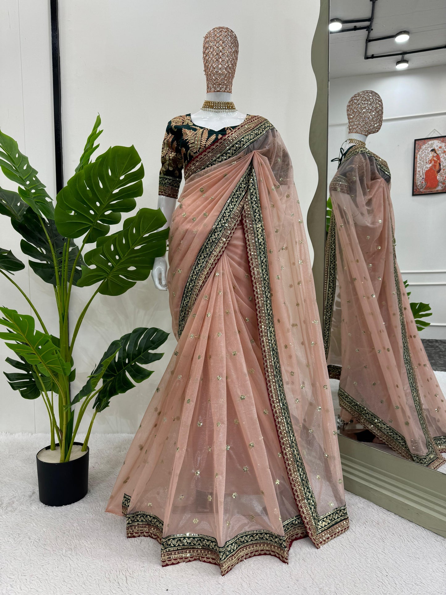 Designer net saree with sequence blouse