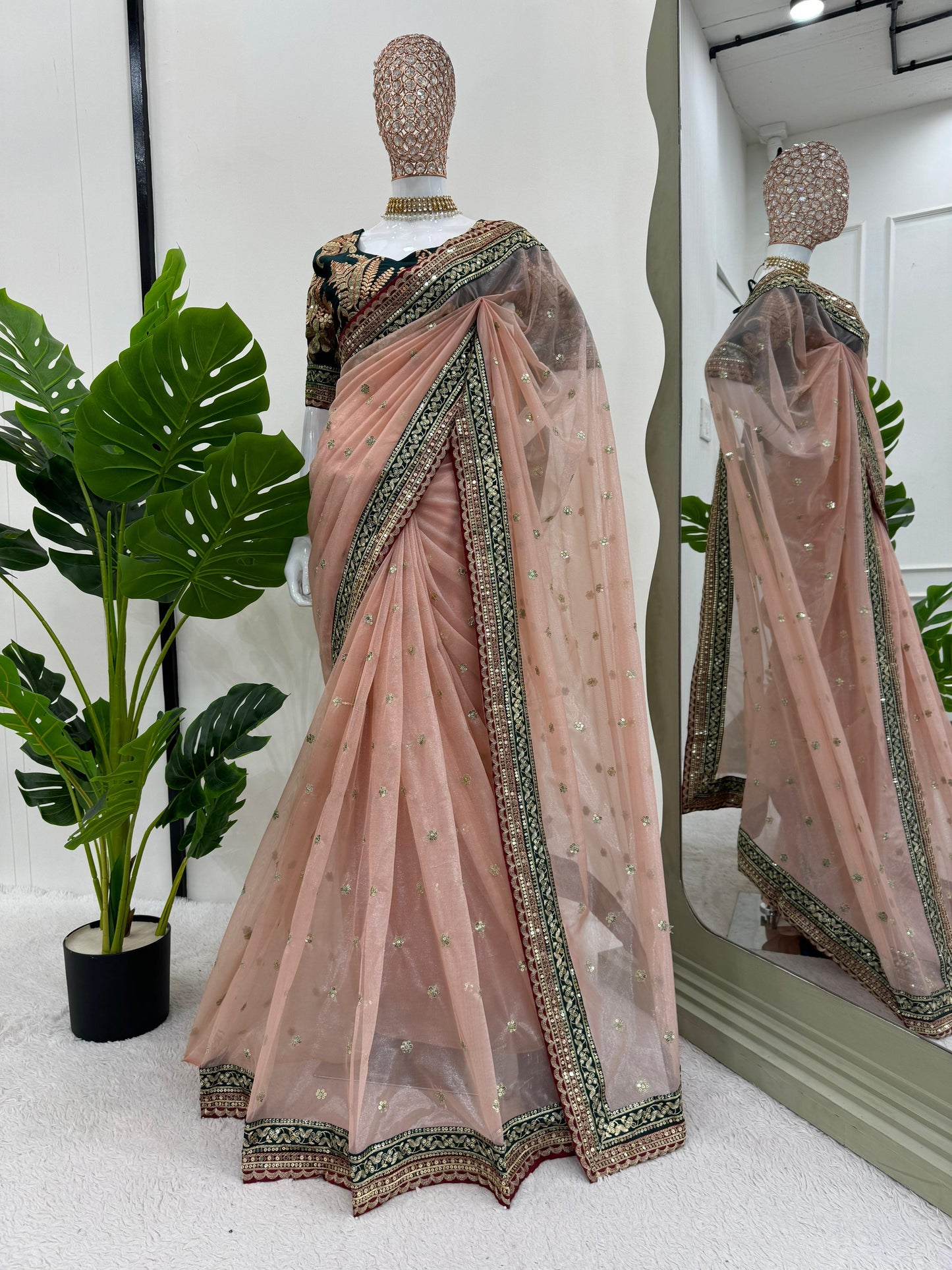 Designer net saree with sequence blouse