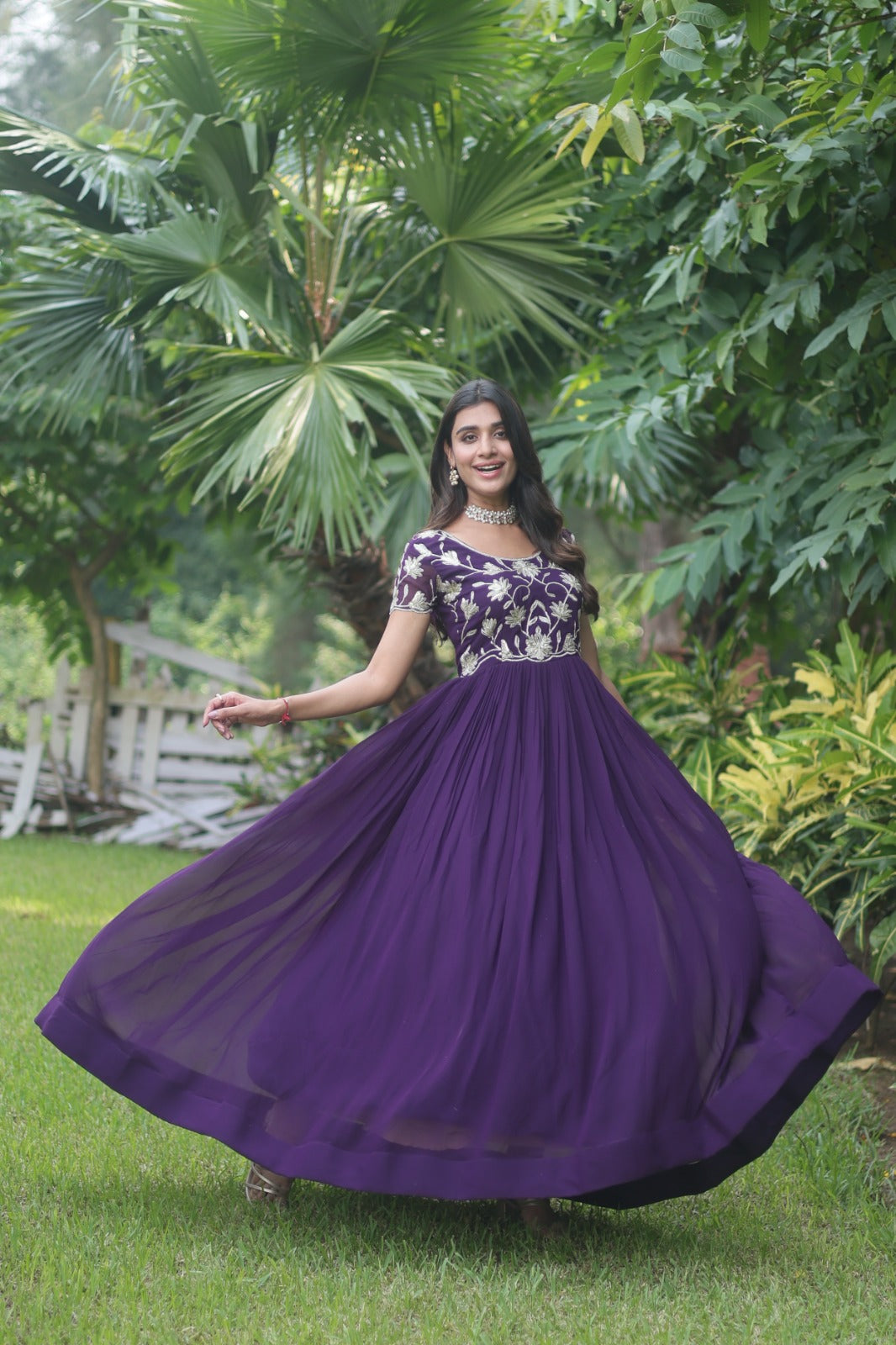 Gown with floral work on top