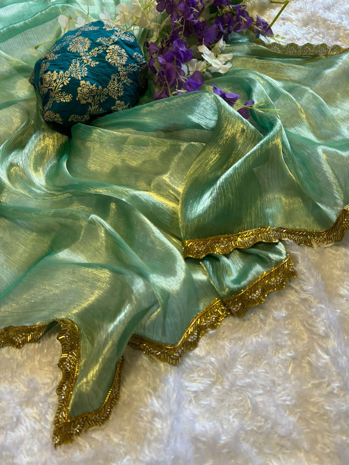 Beautiful Green Jimmy Choo saree with Dola Silk Blouse