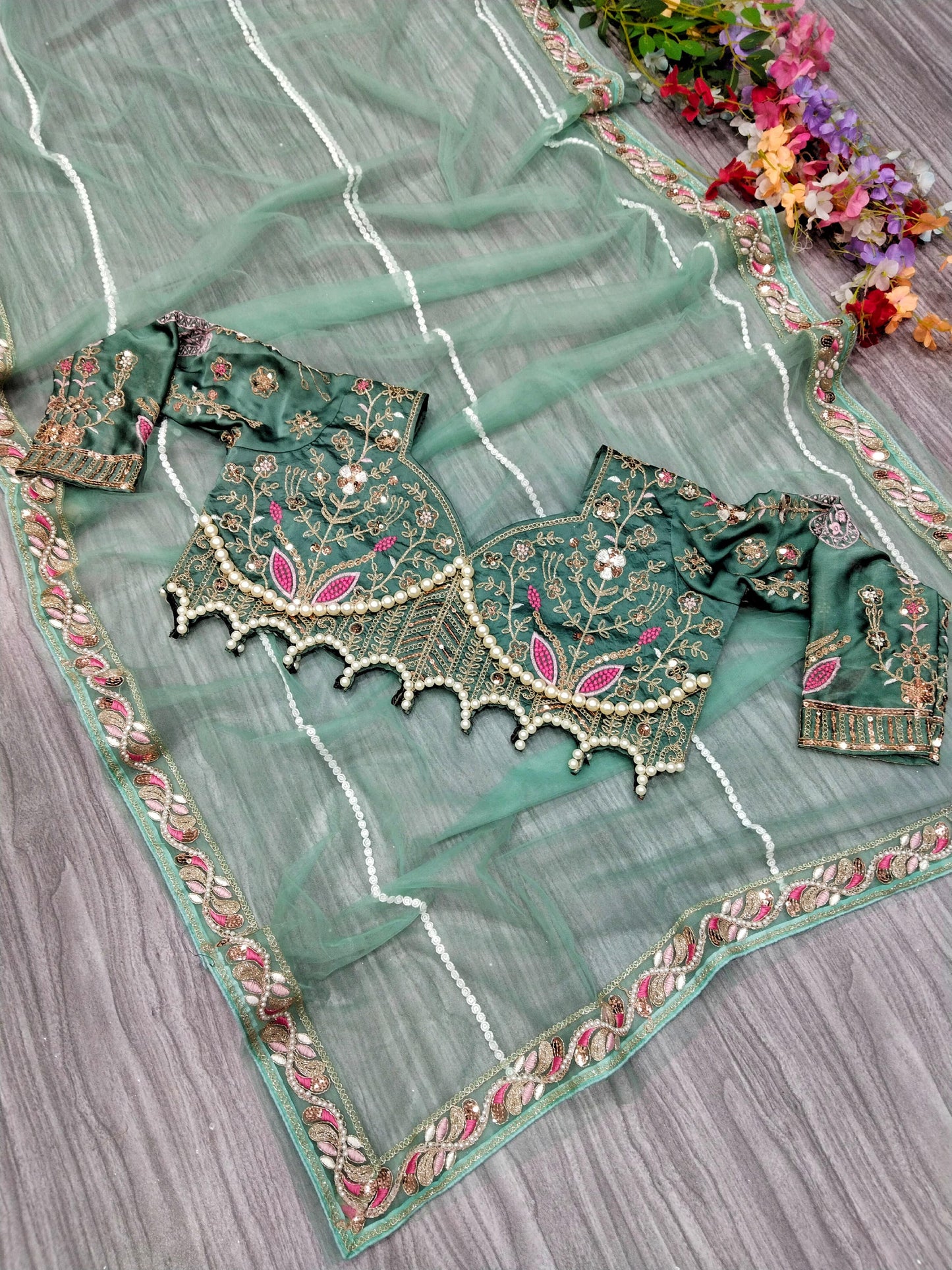 Beautiful Net saree with embellished silk blouse