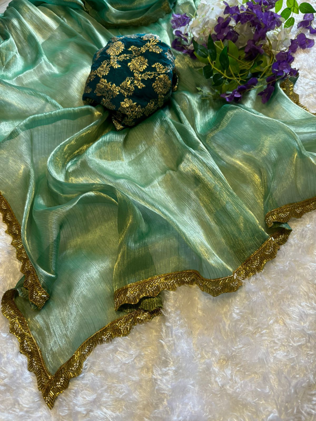 Beautiful Green Jimmy Choo saree with Dola Silk Blouse