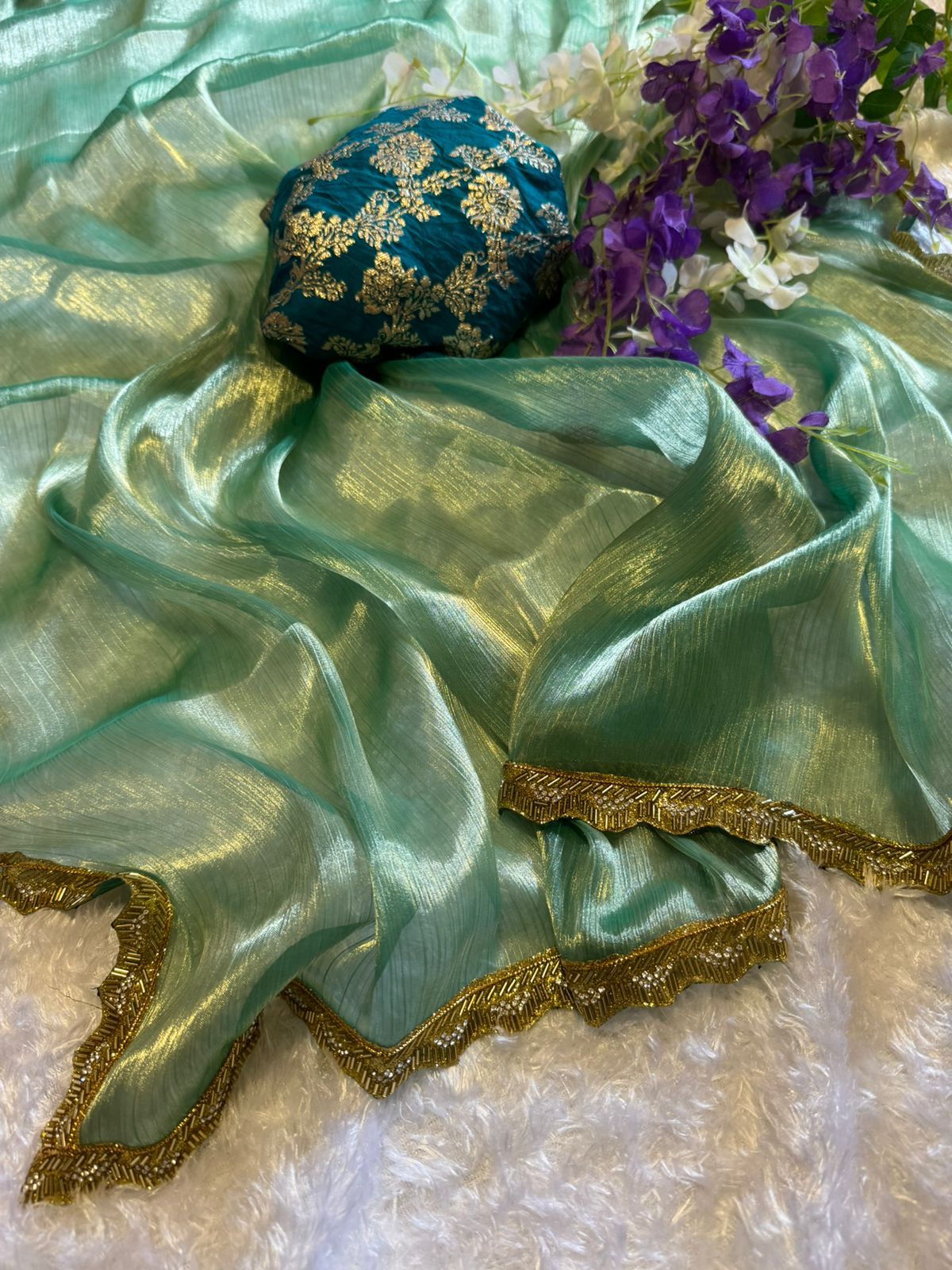 Beautiful Green Jimmy Choo saree with Dola Silk Blouse