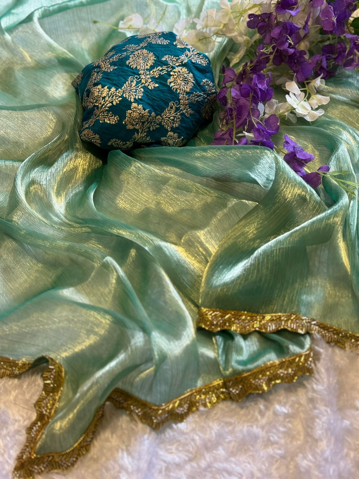 Beautiful Green Jimmy Choo saree with Dola Silk Blouse