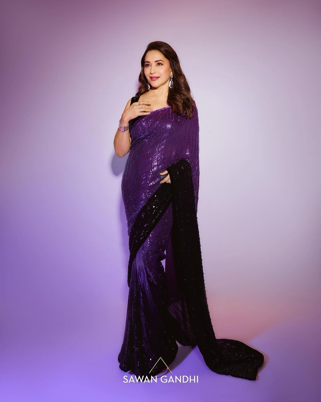 Madhuri Dixit Inspired Black And Purple Sequins Saree